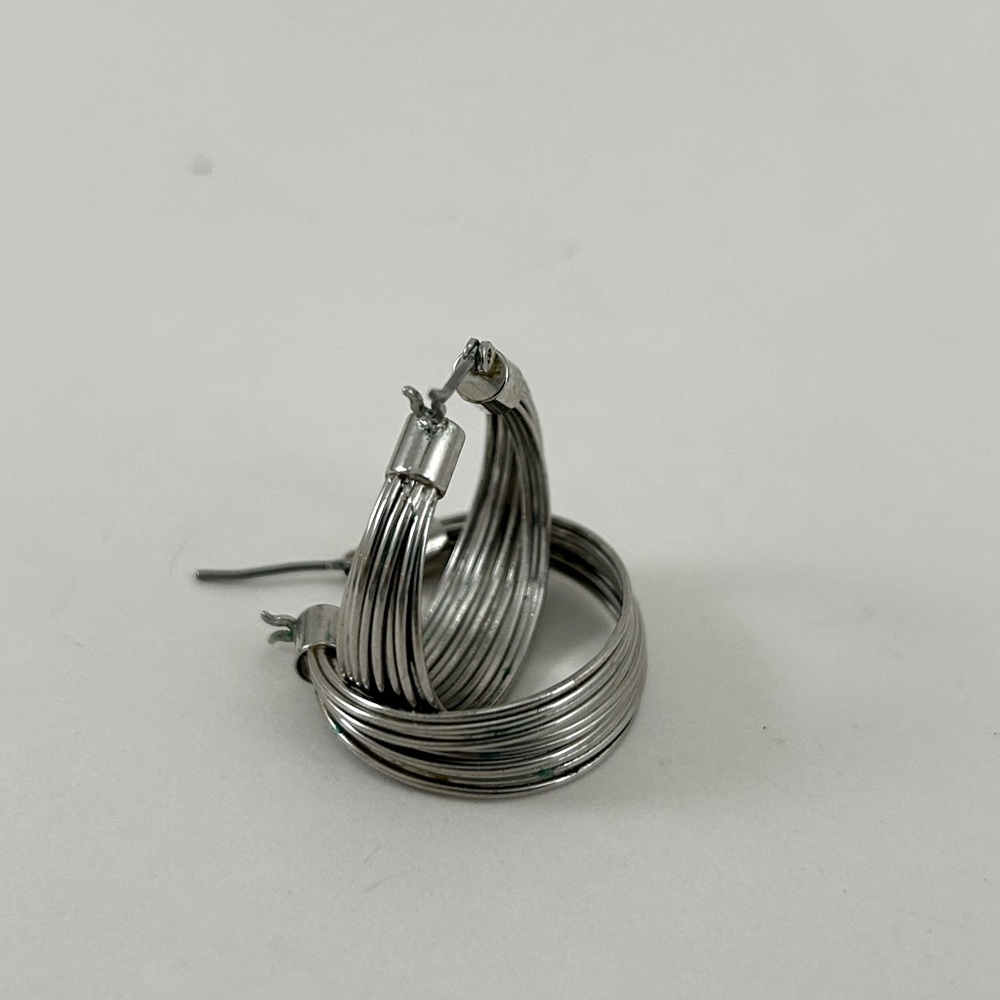 Cute silver toned earrings